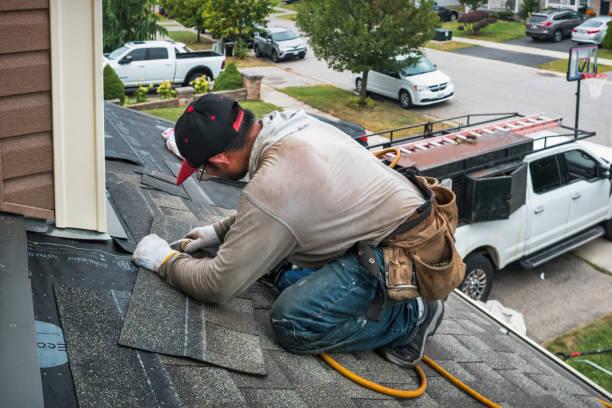 Professional Roofing technician working in Eden, VT